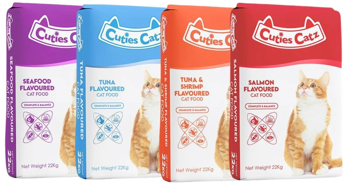 four sacks of all Cuties Catz flavors against white background for Cuties cat food review
